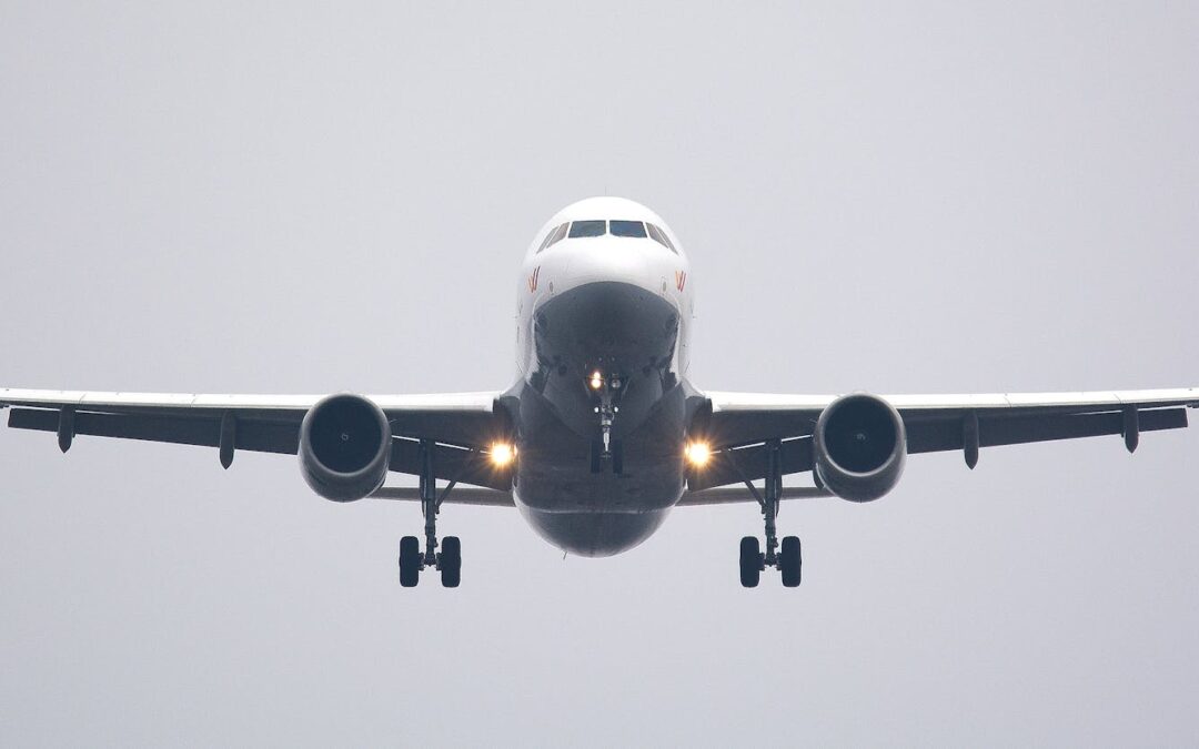 time lapse photography of white commercial airplane